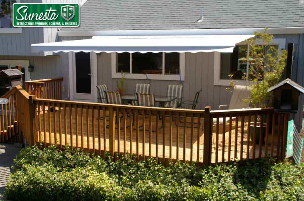 How do Retractable Awnings Handle Rain, Snow and Storms?